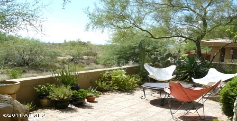 Enjoy mountain views and a lush desert garden... a perfect place to relax under the stars.