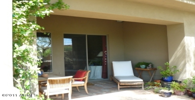 Relax in the shade of the south facing covered patio.