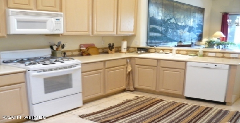 Spacious kitchen with two skylights for the cook.