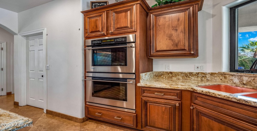 GE Monogram double oven. Double basin copper sink.