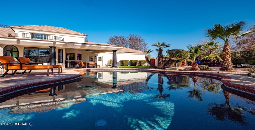 Large pool with pebble tech finish and self cleaning pop ups.