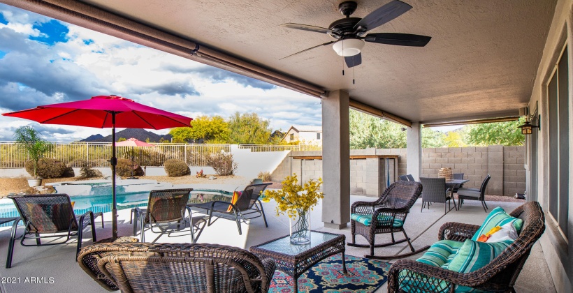 ALSO A BIG DINING TABLE UNDER THE COVERED PATIO FOR DINNERS OUTSIDE!