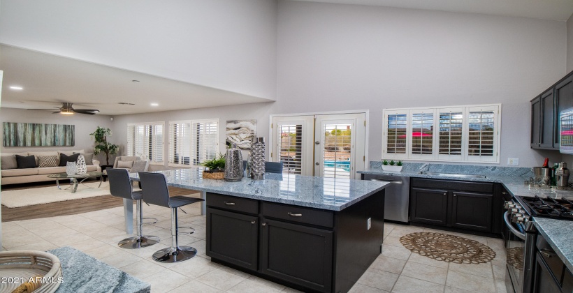 KITCHEN WITH BRAND NEW GRAY AND WHITE GORGEOUS GRANITE! ENORMOUS ISLAND WITH TONS OF SEATING!!! HOLDS 6-9 BAR STOOLS!