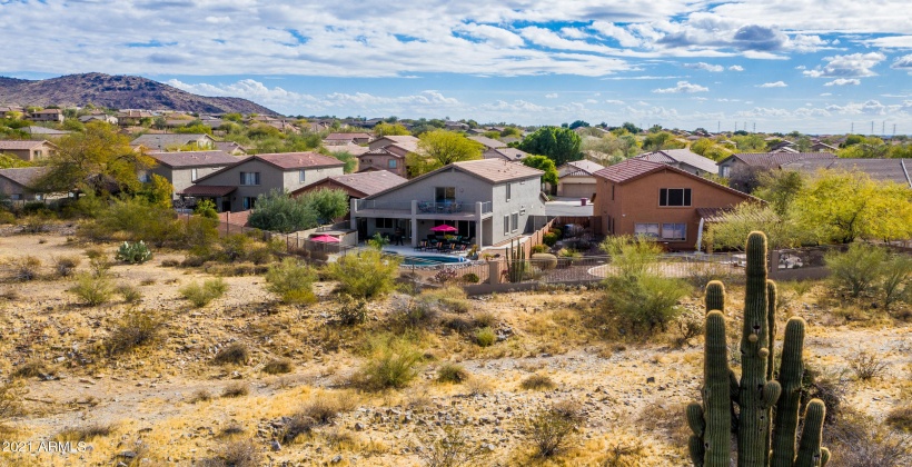 THE MIDDLE GRAY HOUSE WITH THE RED UMBRELLAS!!!! JUST DESERT BEHIND! AND BOTH NEIGHBORS TO THE SIDES DO NOT HAVE SWIMMING POOLS! SO PRIVATE!