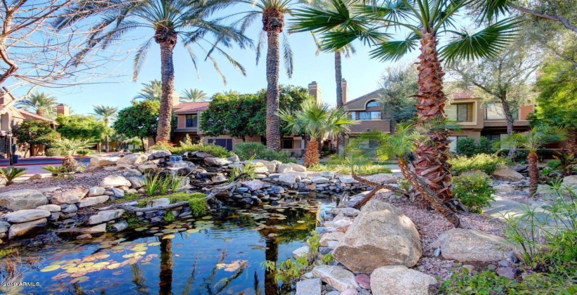 beautiful landscaping throughout grounds...koi ponds