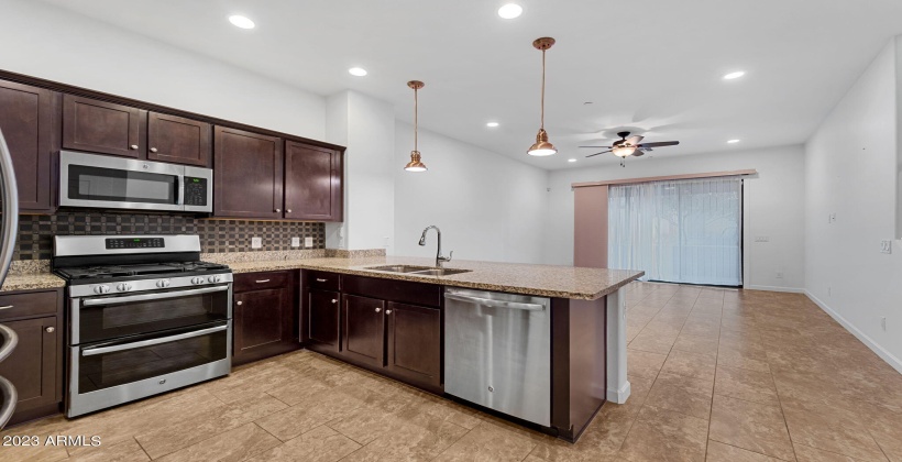 Kitchen with upgraded Appliances, Custom Backsplash & Kitchen island