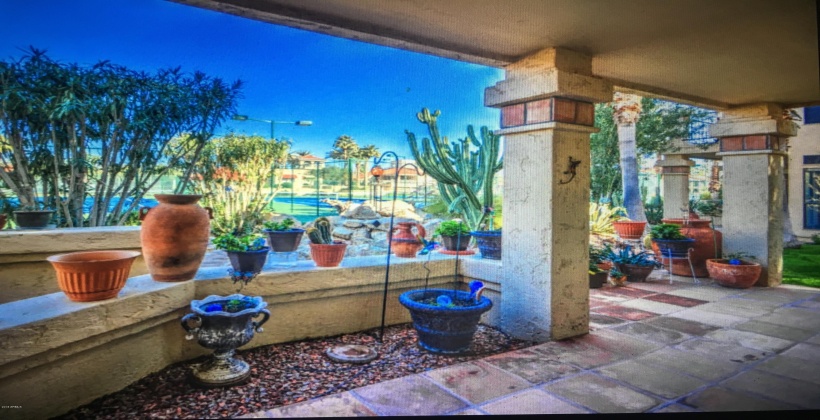 Back Patio View to the Tennis courts. This area has New Pots and Plants not shown in this pic.