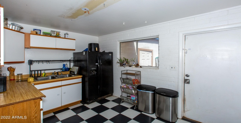 Unit #2 Eat-In Kitchen with door to private backyard.