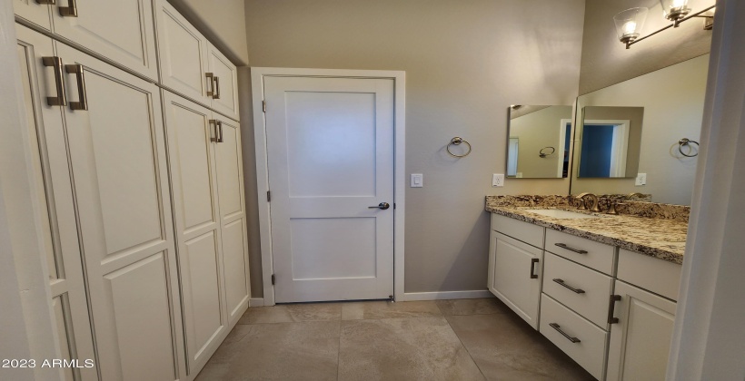 ACTUAL PICTURE OF THE HALL BATH. LARGE BUILT IN LINEN CABINETS