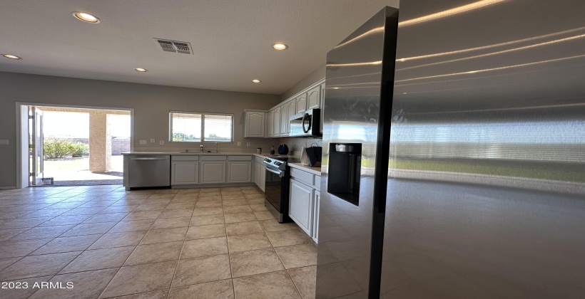 Refinished Cabinets and New Quartz Countertops!