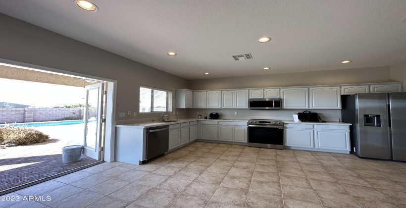 Refinished Cabinets and New Quartz Countertops!