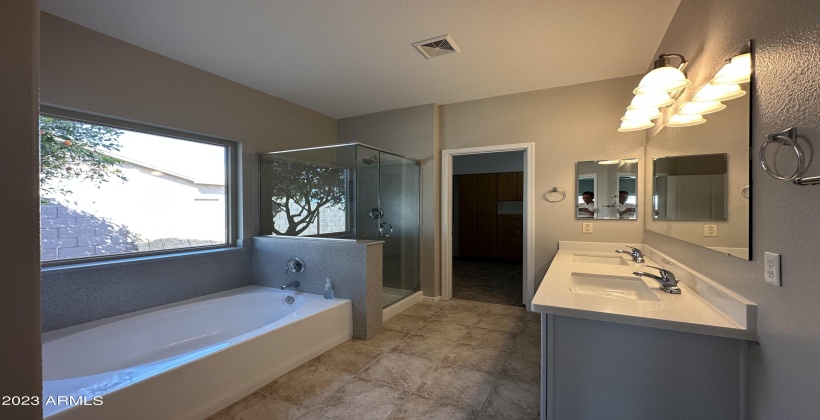 Refinished Bath and Shower Surrounds and cabinets as well as new quartz!