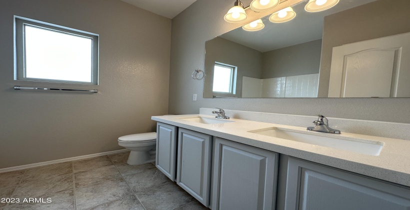 Hall Bath with refinished Cabinets and New Quartz Countertops!