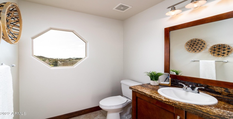 Granite countertops in all baths.