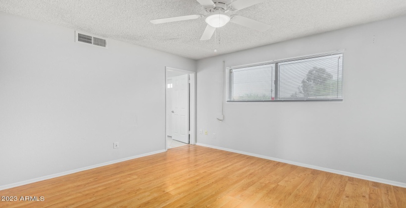 Access from Primary bedroom to enjoy the backyard.