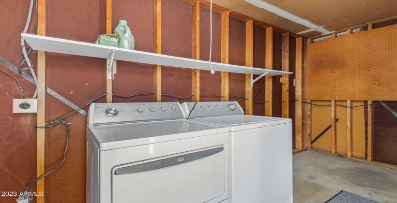 Large laundry facility to build multiple shelves and lots of storage.