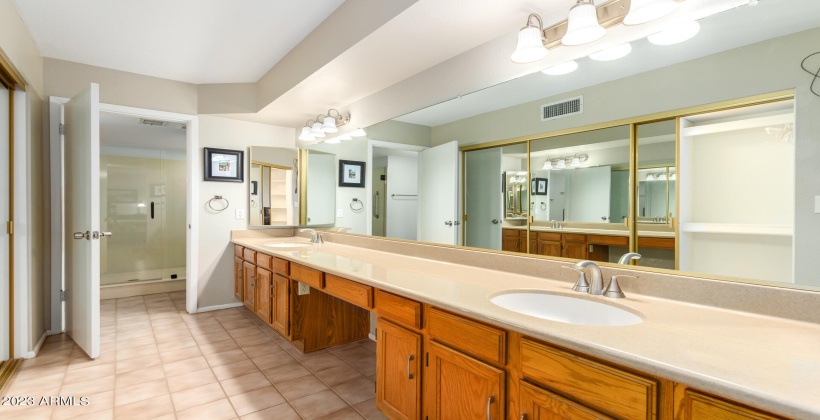 Oversized Vanity with Plenty of Storage. Master Closet to left. Large Shower and Toilet in Separate Room with Additional Storage.