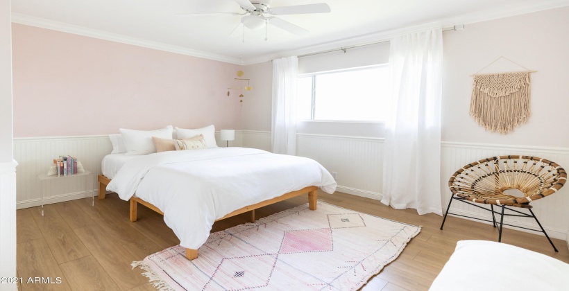 Secondary bedroom with queen bed, organic sheets and feather duvet.