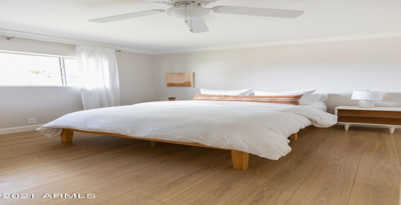 Third bedroom with queen bed, organic sheets and feather duvet.