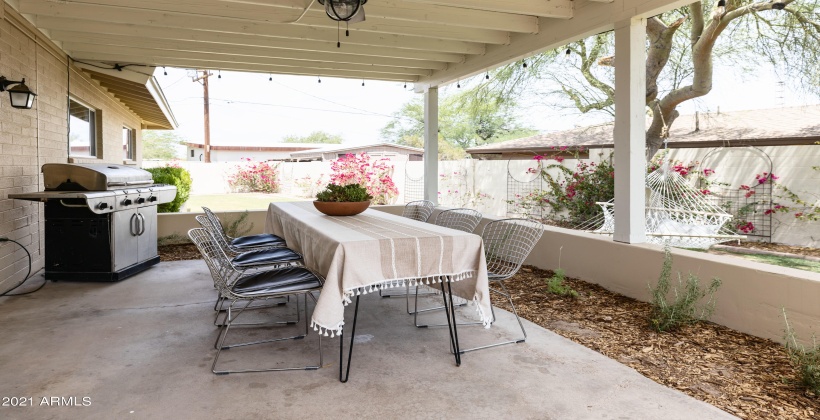 Outdoor dining and grilling space.