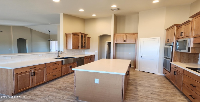 ACTUAL PICTURE OF THE KITCHEN WITH LARGE ISLAND, AND UPGRAGED CABINETS