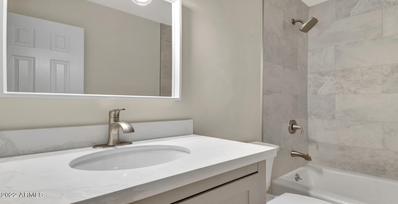 New Lighting, vanity, gorgeous shower and new tub