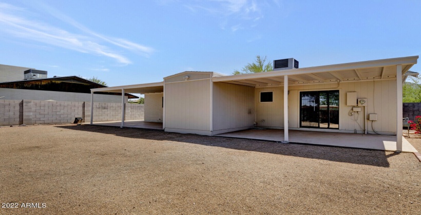 2- Large Covered Patio showing Laundry and Storage in the middle.