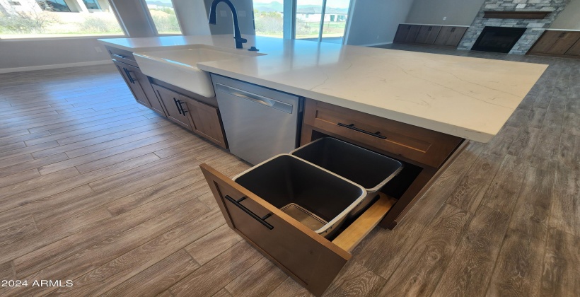 KITCHEN ISLAND WITH TRASH DRAWER