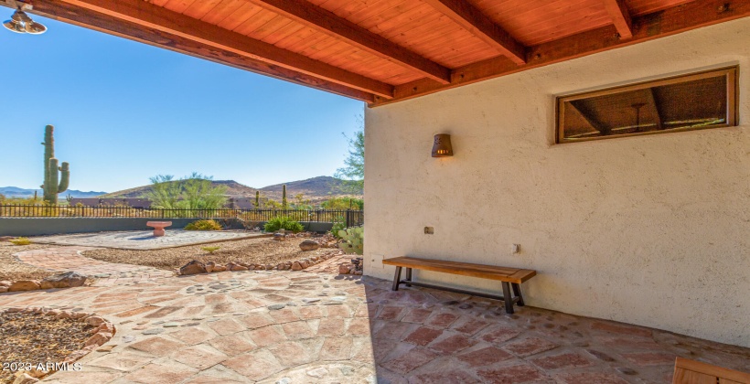 This patio is a generous 900 s/f fenced with hand forged stone and brick walkway. Keyhole mason wall (not shown) gives a preview of the North (reception) patio.