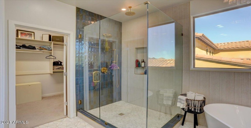 Upgraded soaking tub and glassed shower