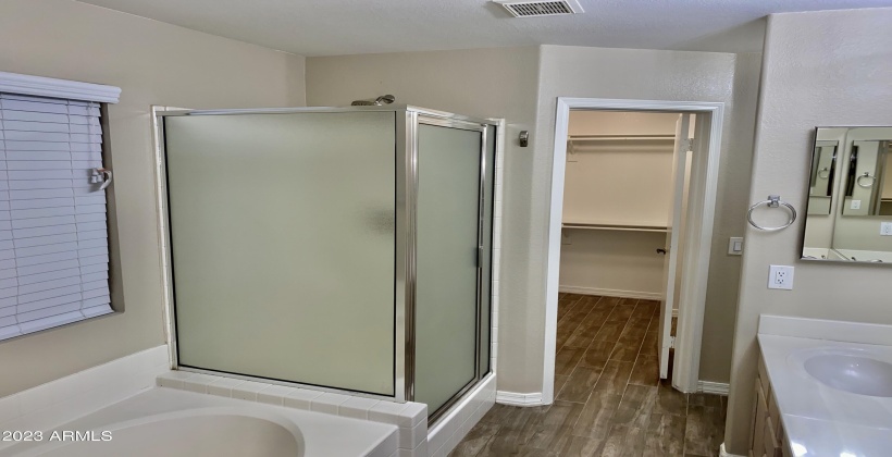 Master Bath - Features a Separate Shower and Tub, and Dual Sinks.