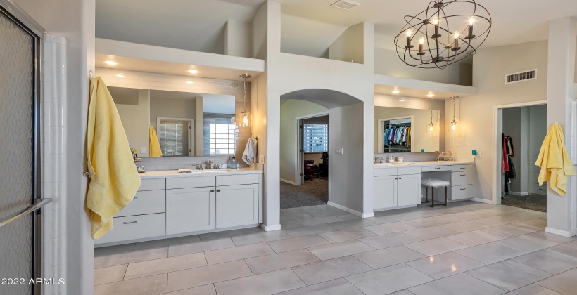 Primary Bathroom with double sinks and built-in make-up vanity