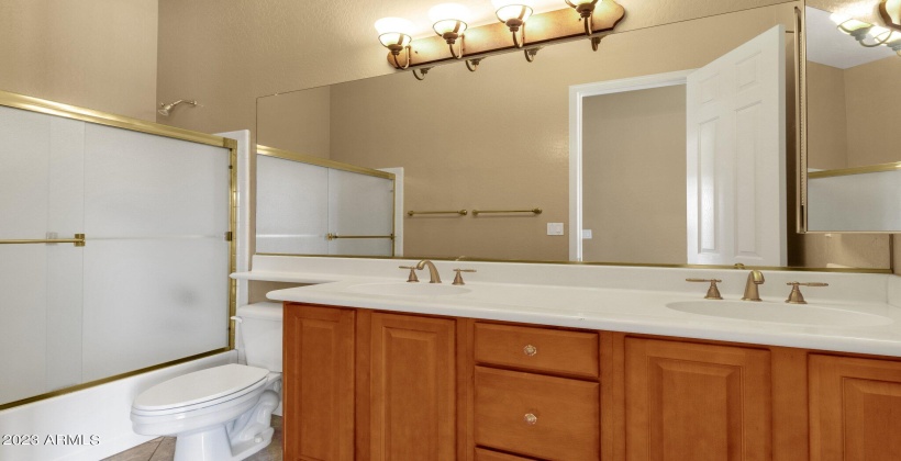 Main level guest bedroom 2 bath with dual sinks
