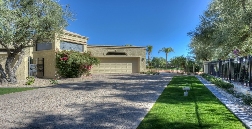 Longest driveway in the Community leads to a 2-car garage