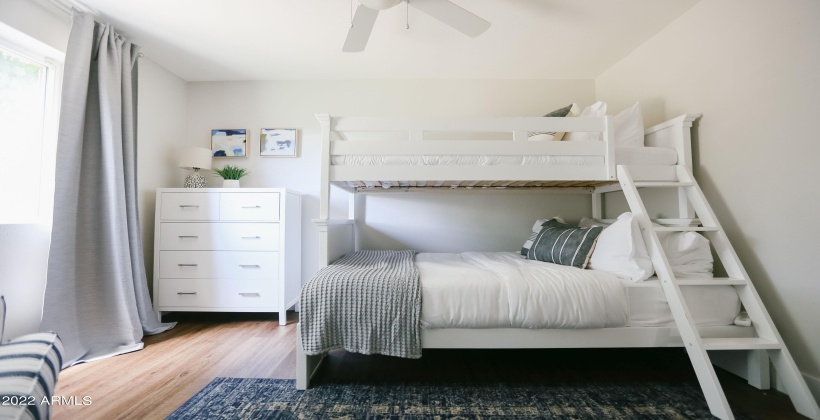 Guest room #2 sleeps three guests on these fun bunk beds. The bottom bunk is a full size bed, and the top is a twin