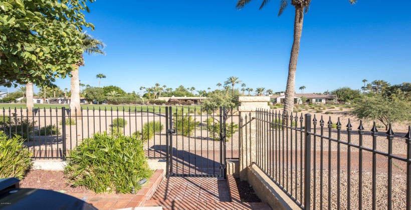 Villa Backyard Gate opens to the course.