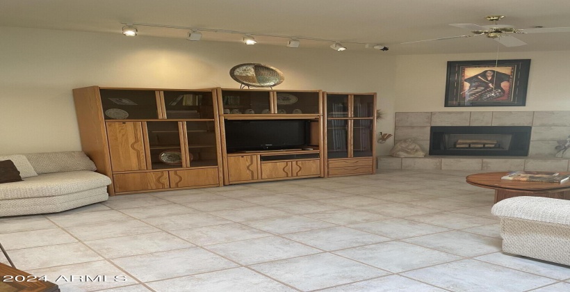 Tile flooring throughout traffic areas from front door to great room back door.