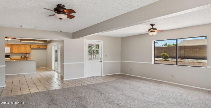 Large extra family room with newer carpet and views out the large windows