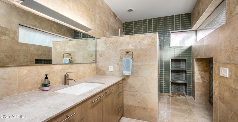 3rd Bedroom Full En-Suite Bathroom featuring single vanity and stand-in shower.