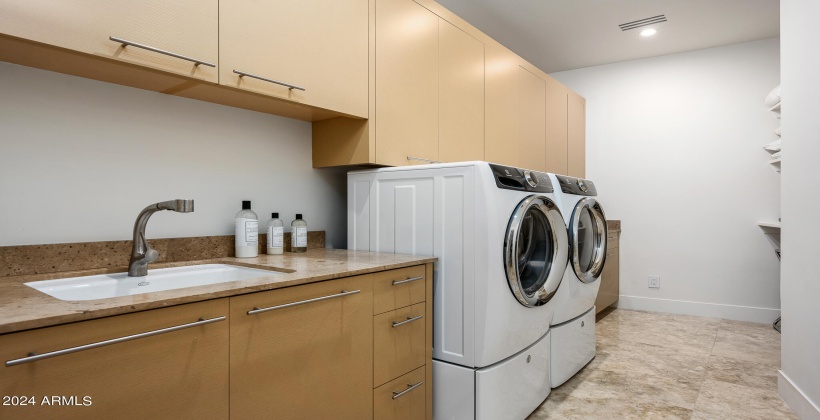 Laundry Room featuring in-home washer and dryer.