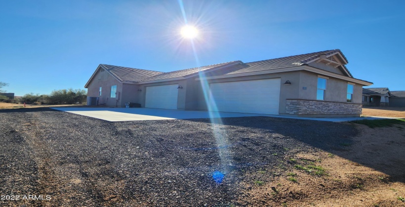 4 CAR SIDE FACING GARAGE - ACTUAL PHOTO OF FINISHED HOME