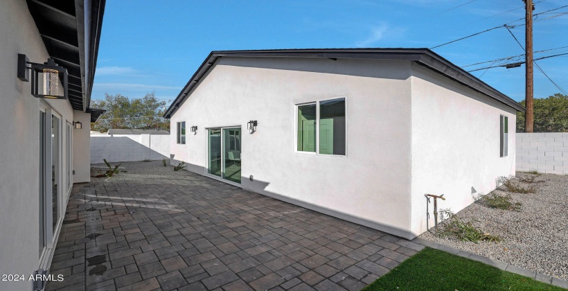 Pavered back patio/courtyard to Guest home