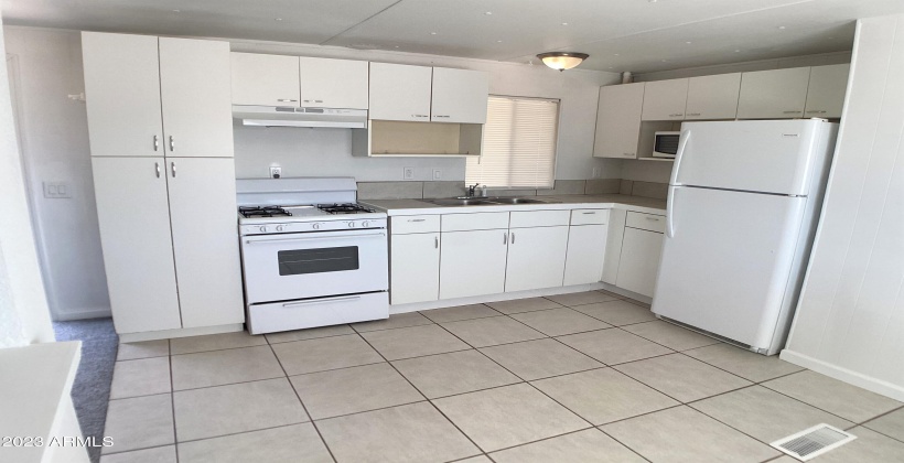 New cabinets and counter provide lots of stroage and the upgraded appliances make meal prep easy.