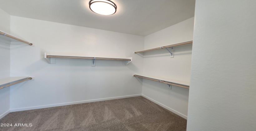 WALK IN CLOSET IN MASTER (ACTUAL PICTURE OF THE FINISHED HOME AS OF APRIL 7, 2024)