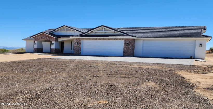 OVERSIZE 4 CAR GARAGE (ACTUAL PICTURE OF THE FINISHED HOME AS OF APRIL 7, 2024)