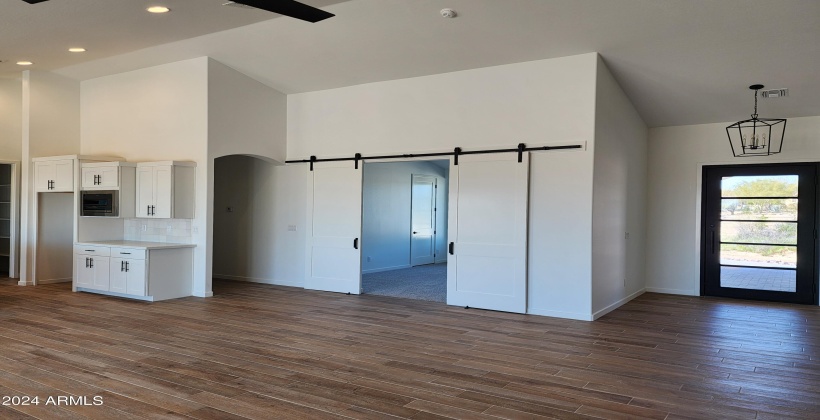 BARN DOORS TO THE DEN OR OFFICE (ACTUAL PICTURE OF THE FINISHED HOME AS OF APRIL 7, 2024)