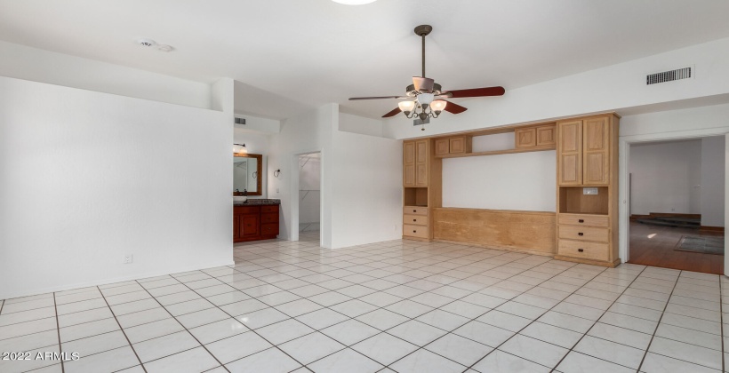 Master bedroom with built in cabinetry