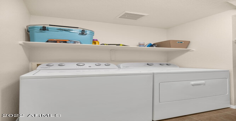 Large laundry room plus an attached garage!