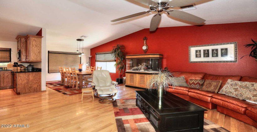 Opens to the Dining area & Kitchen. Wood Floors