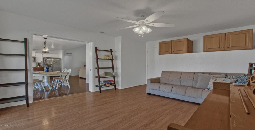 Bonus room off the kitchen. Futon pulls out to sleep two comfortably. Piano available, if you are so inclined.